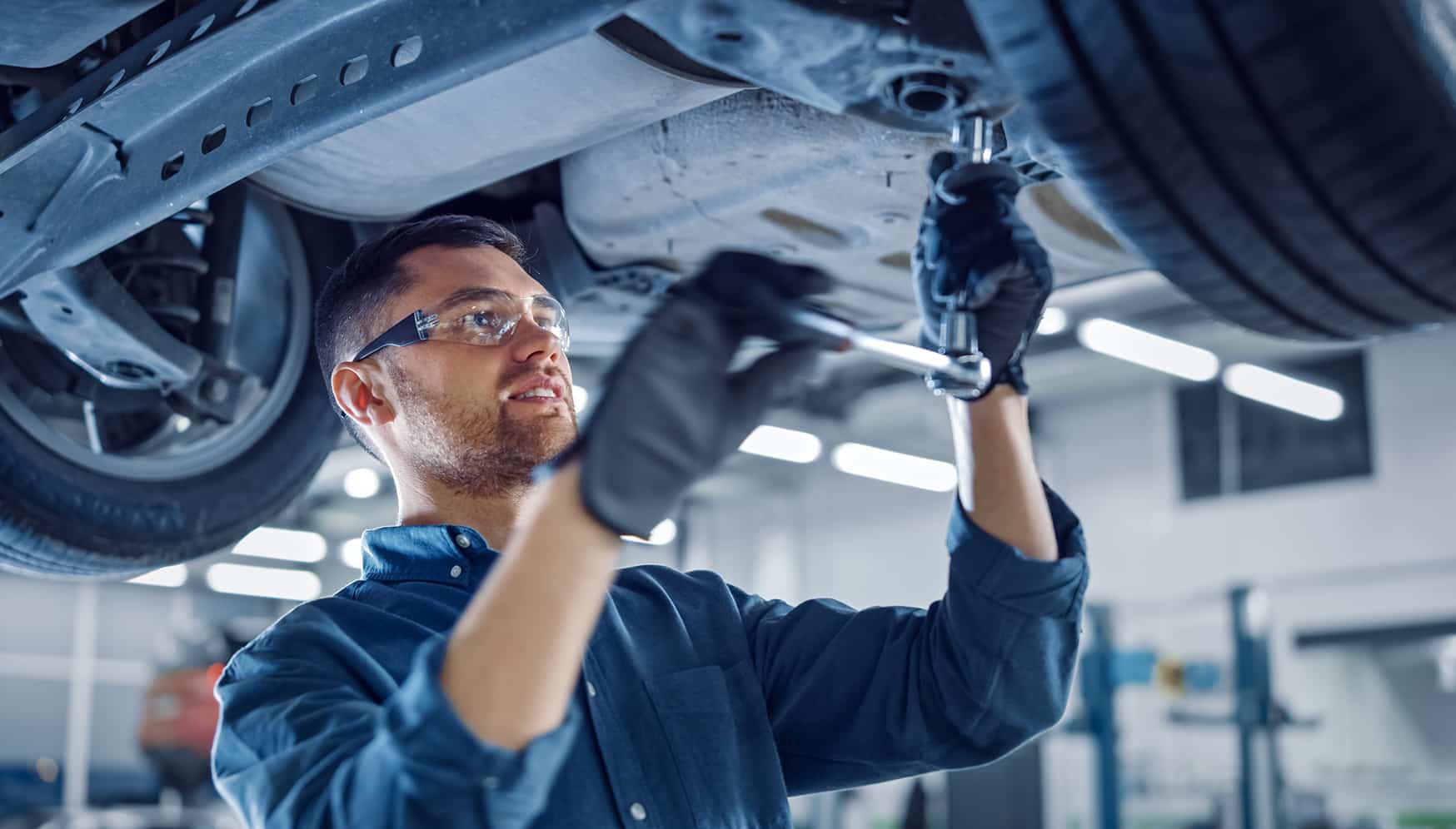 a man working on a car