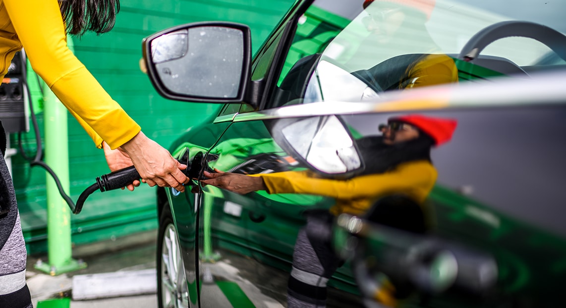 a person opening a car door