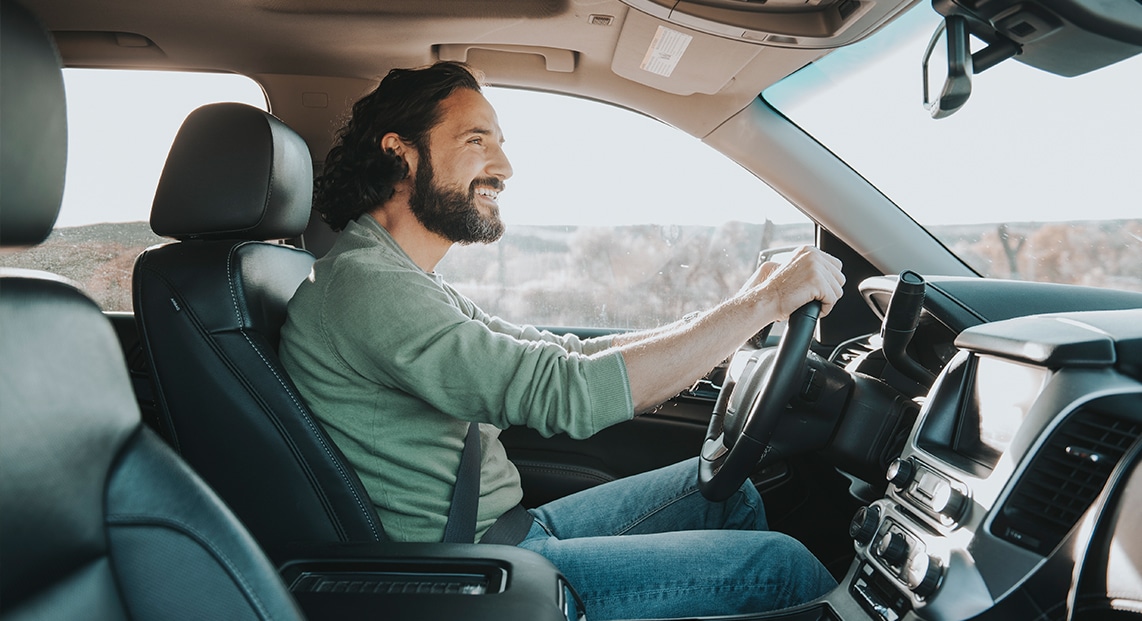 a man driving a car