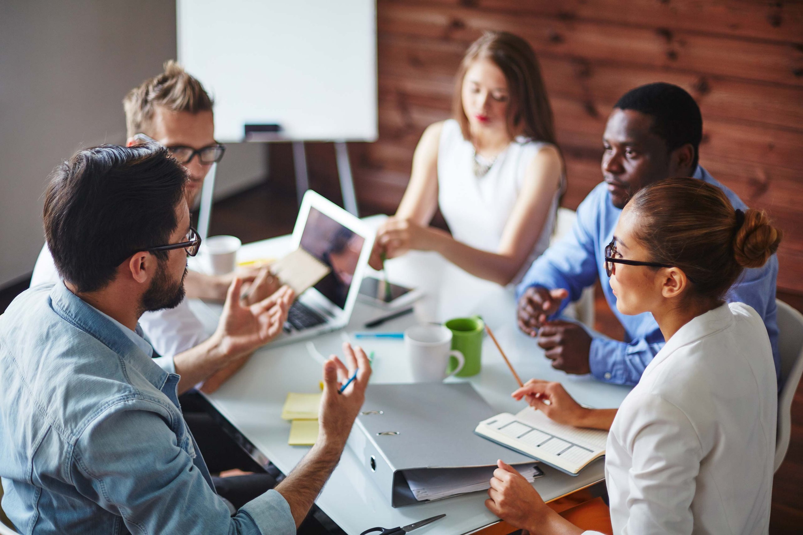 Fleet professionals working around a table