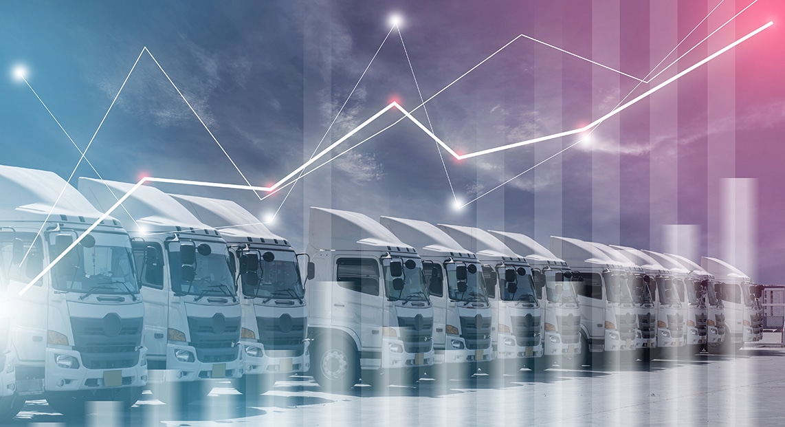 a row of trucks with graphics and blue sky