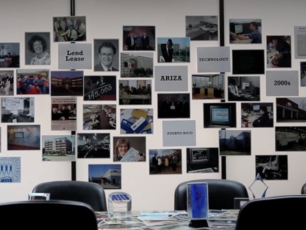 a wall of pictures on a wall