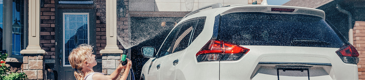 a car being washed by a person