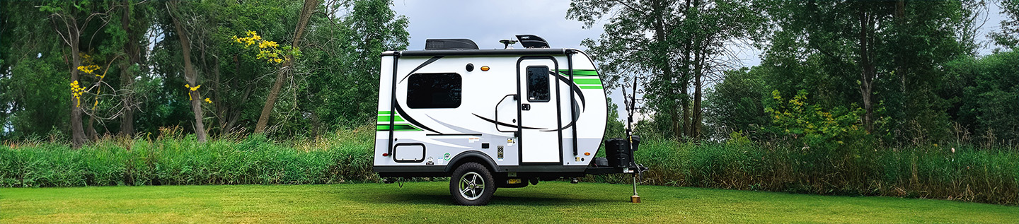 a white and green rv