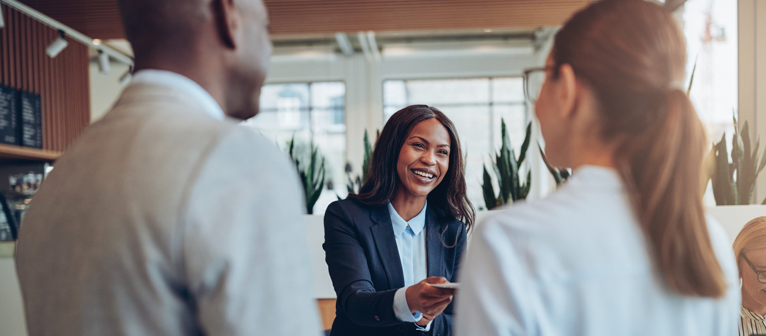 An insurance professional engaged in a business meeting