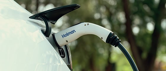 a white car parked and charging