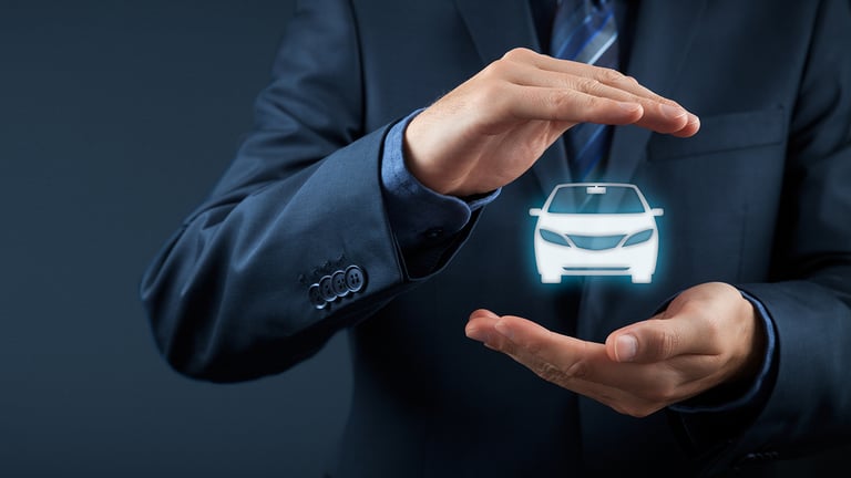 Man protecting virtual car icon