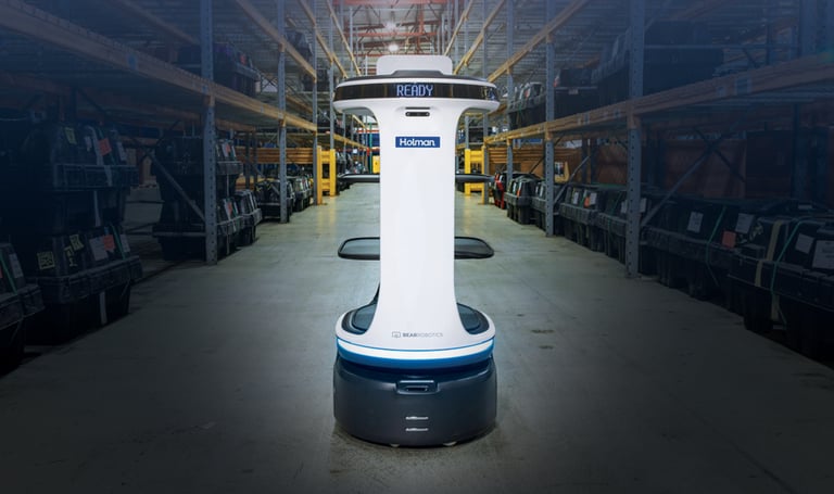Autonomous robot in warehouse setting.