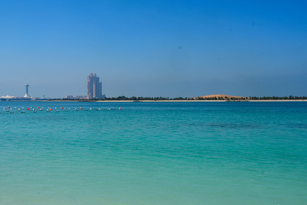 Abu Dhabi city skyline at dusk with modern skyscrapers