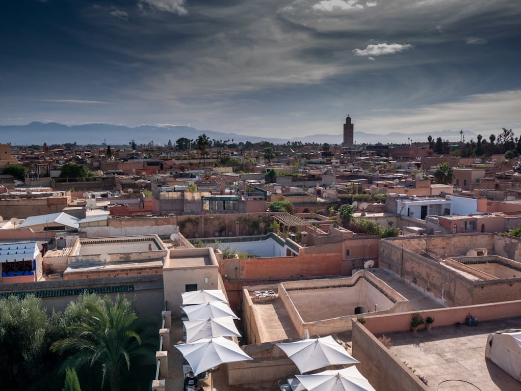 Vibrant Marrakech souk with lanterns and spices