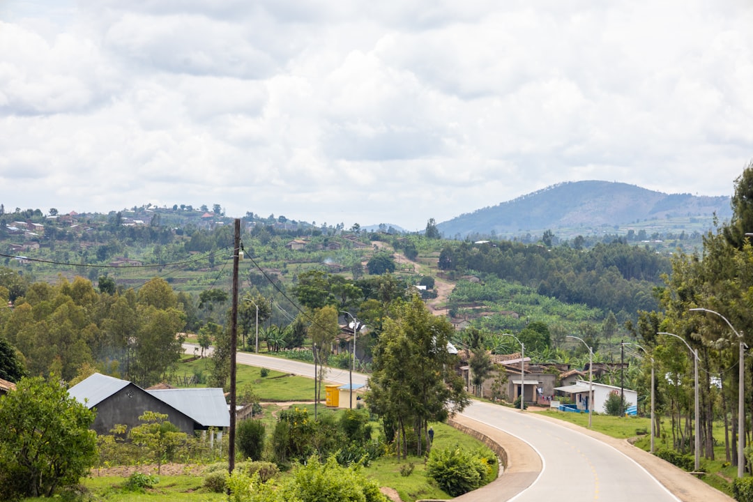 Rwandan artisans creating traditional Imigongo art