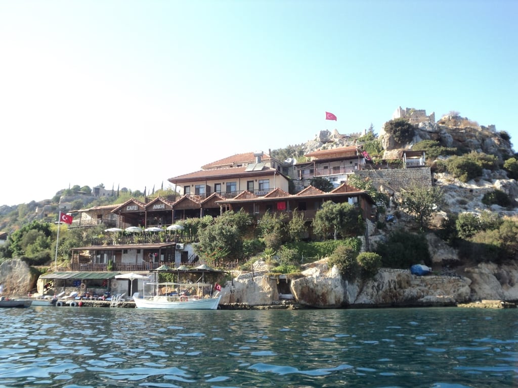 Person ziplining over a river canyon in Antalya