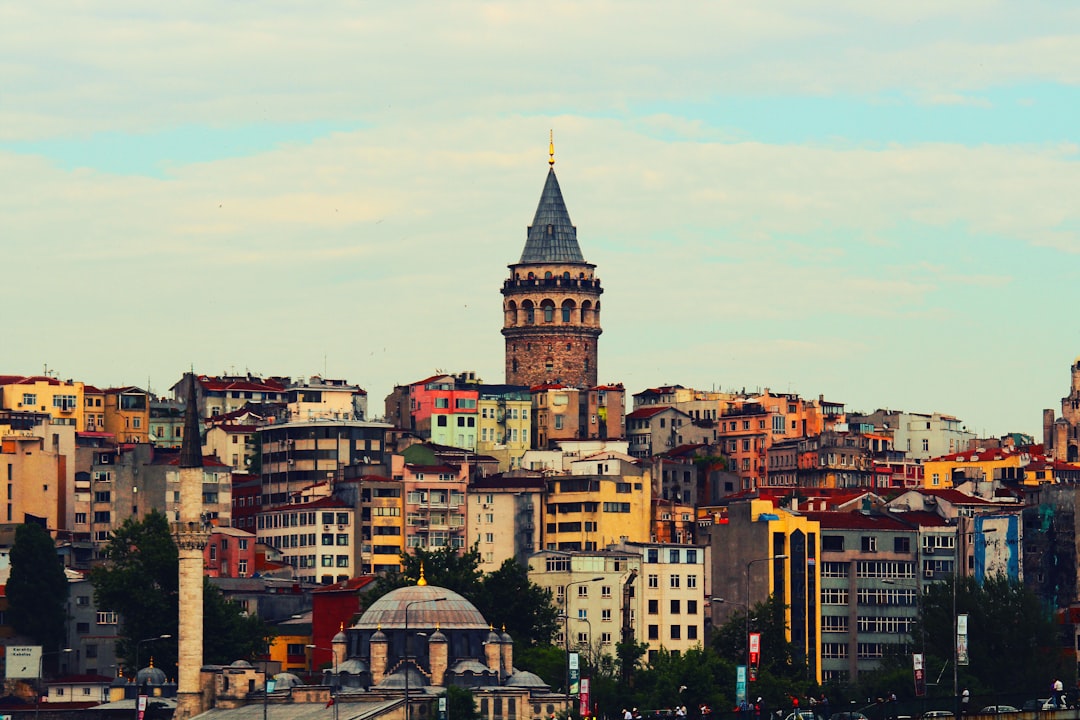 Panoramic view of Istanbul skyline with Hagia Sophia, Blue Mosque, and Bosphorus at sunset