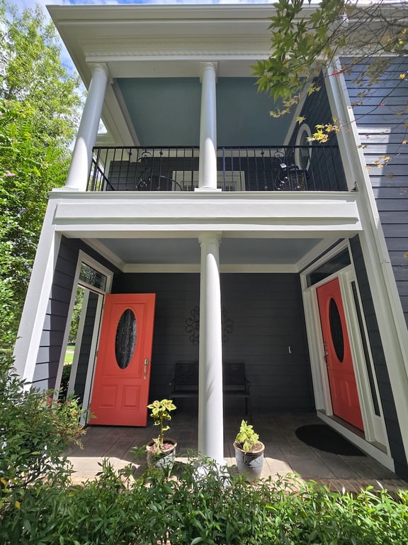 Red Earth painted front door in Fall River.