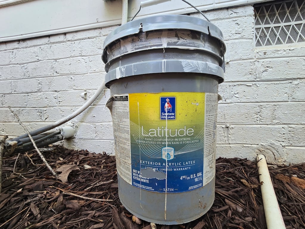 Latitude paint in an extra white base used to paint brick and siding on a home in Raleigh.