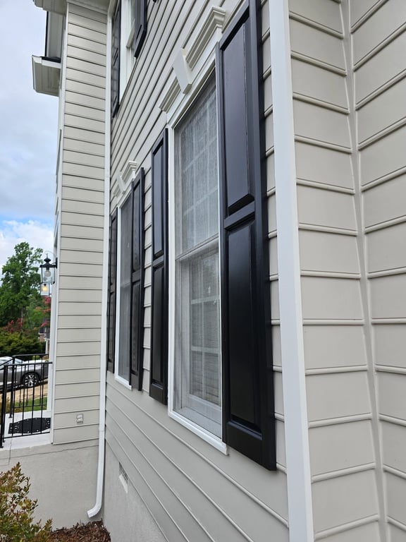 Tricorn Black paint color on exterior shutters in a gloss finish in Raleigh, NC.
