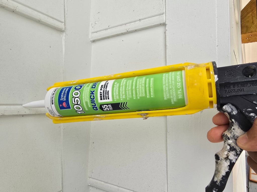 Sherwin-Williams 1050QD quick dry white 55 year caulking. 