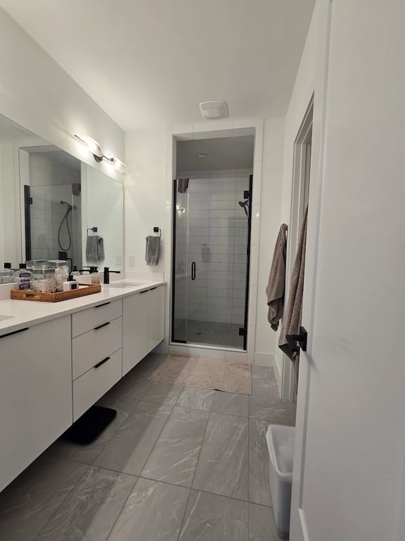 Small bathroom with white walls and ceilings in Durham, NC. 