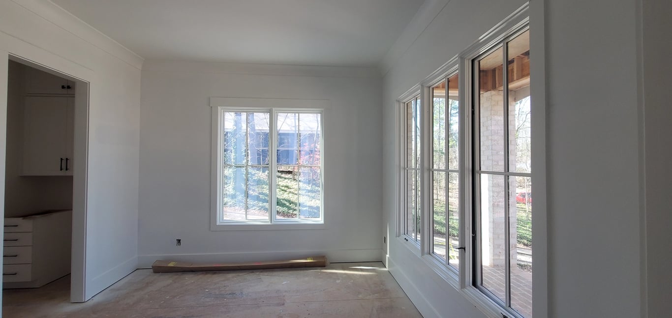 Finished fine-finish interior trim on Ocotea Drive in the Hampton Hills neighborhood of Raleigh, NC, showcasing a seamless, museum-quality finish achieved through professional substrate preparation and painting.