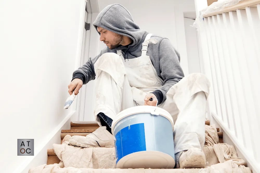 Painter-Brushing-Trim