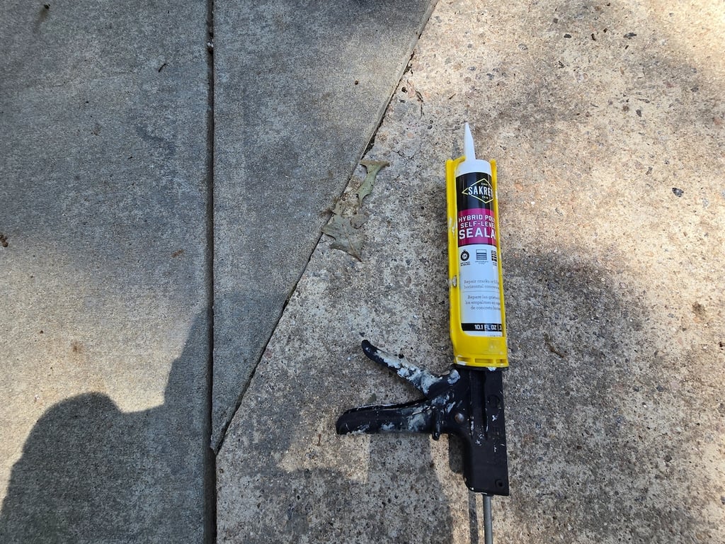 Sakrete sealant applied to a concrete driveway in Raleigh, NC.