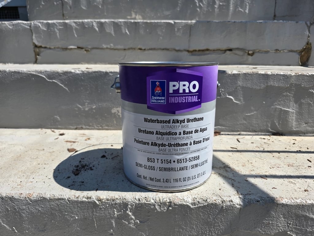 Close-up of Sherwin-Williams Pro Industrial water-based alkyd paint used for professional residential and metal restoration projects in Raleigh, NC, providing a durable, non-yellowing finish for Triangle area homes
