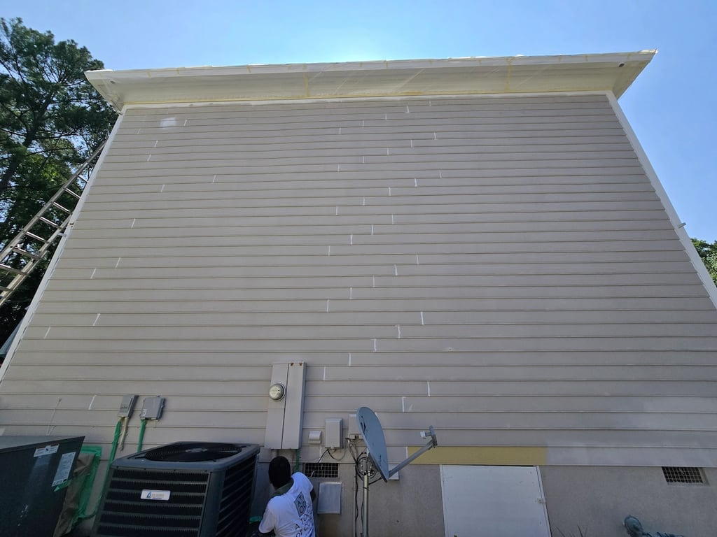 Caulked exterior trim and siding on the exterior of a home on Tanworth Drive in Raleigh, NC after repairs are complete. 