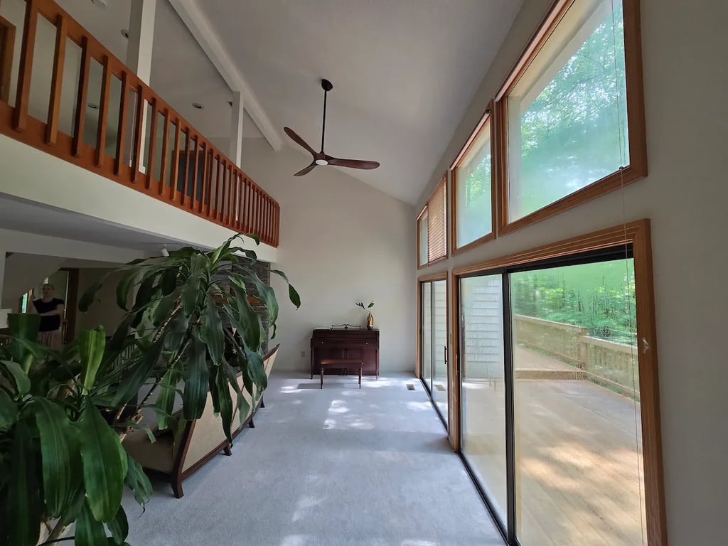 Custom interior water-based wood staining on Dolans Way in the Carmel Forest subdivision of North Raleigh, NC, by A Touch of Color Painting & General Contracting, showcasing expert color matching on natural grain.