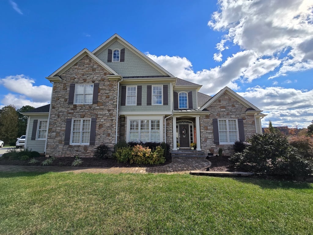 10 years later in 2026 showing very little paint wear after applying Sherwin Williams Duration exterior paint at Baynam Pond Drive.