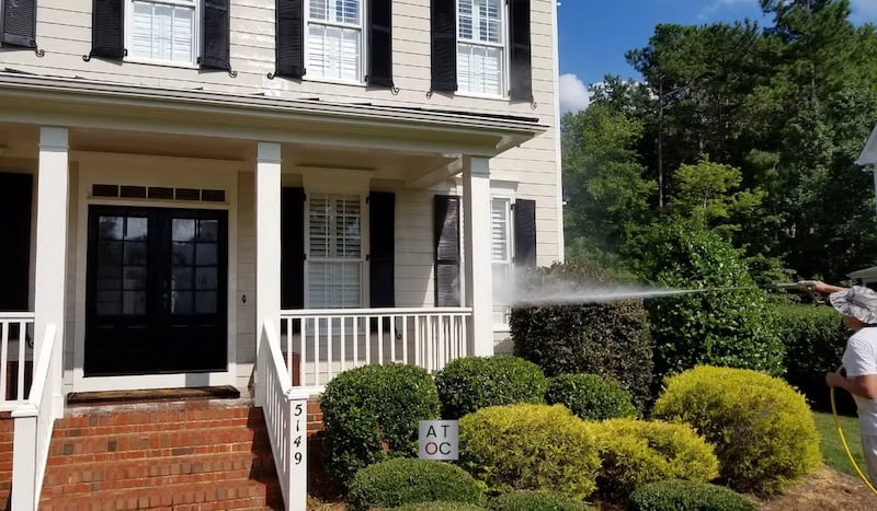 A soft wash and removing organic growth before painting outdoors.