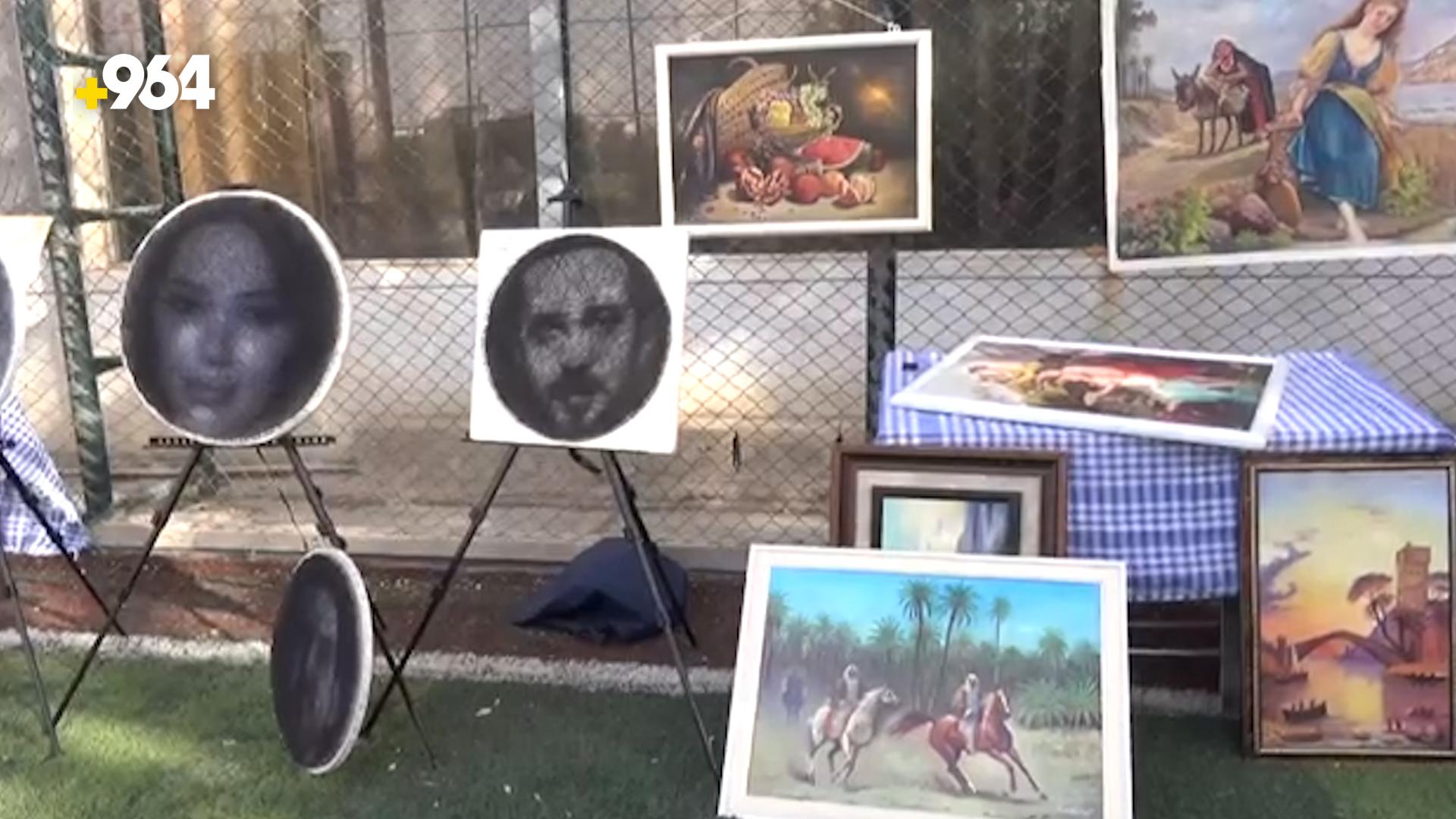 رسموا رحمة رياض ونشأت أكرم وعبدالوهاب الساعدي في معرض خريف طوزخورماتو (فيديو)