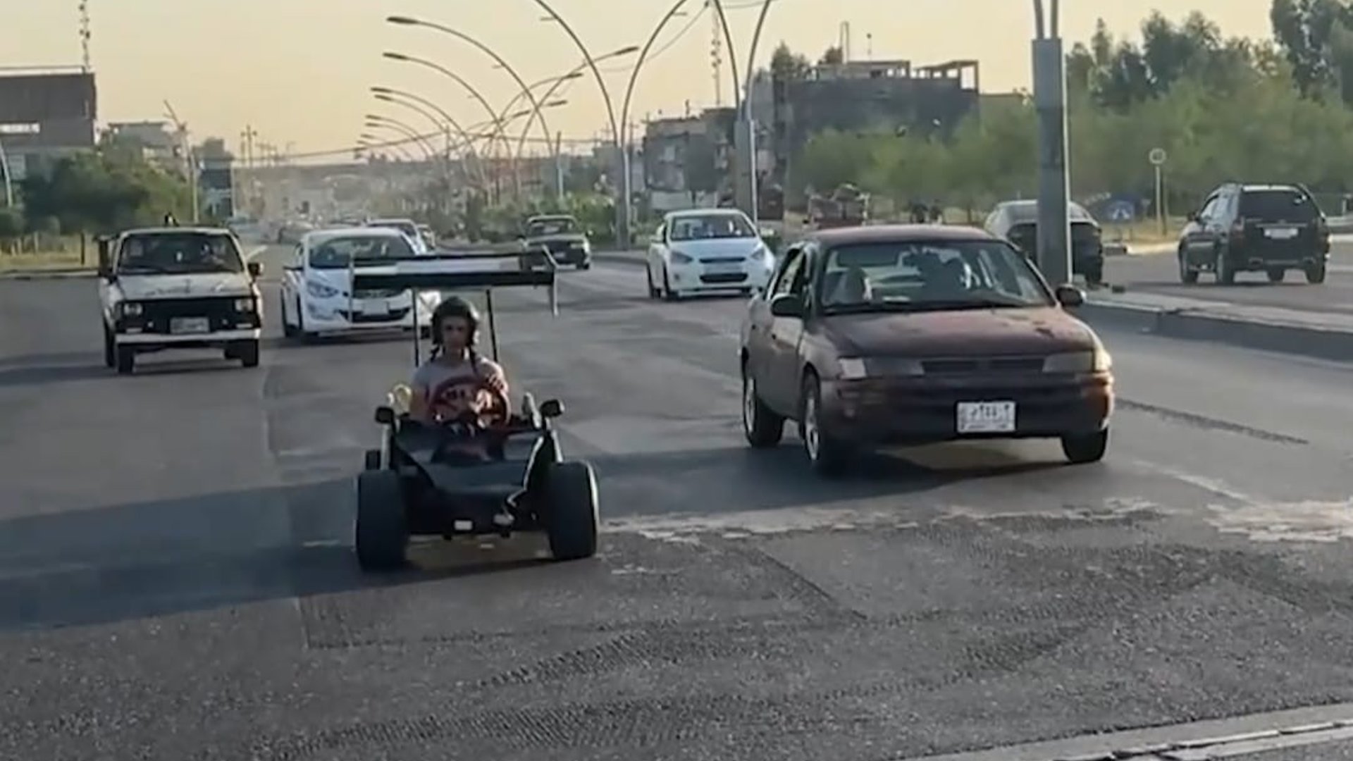 Mosul man builds small car from scrap becoming a local star