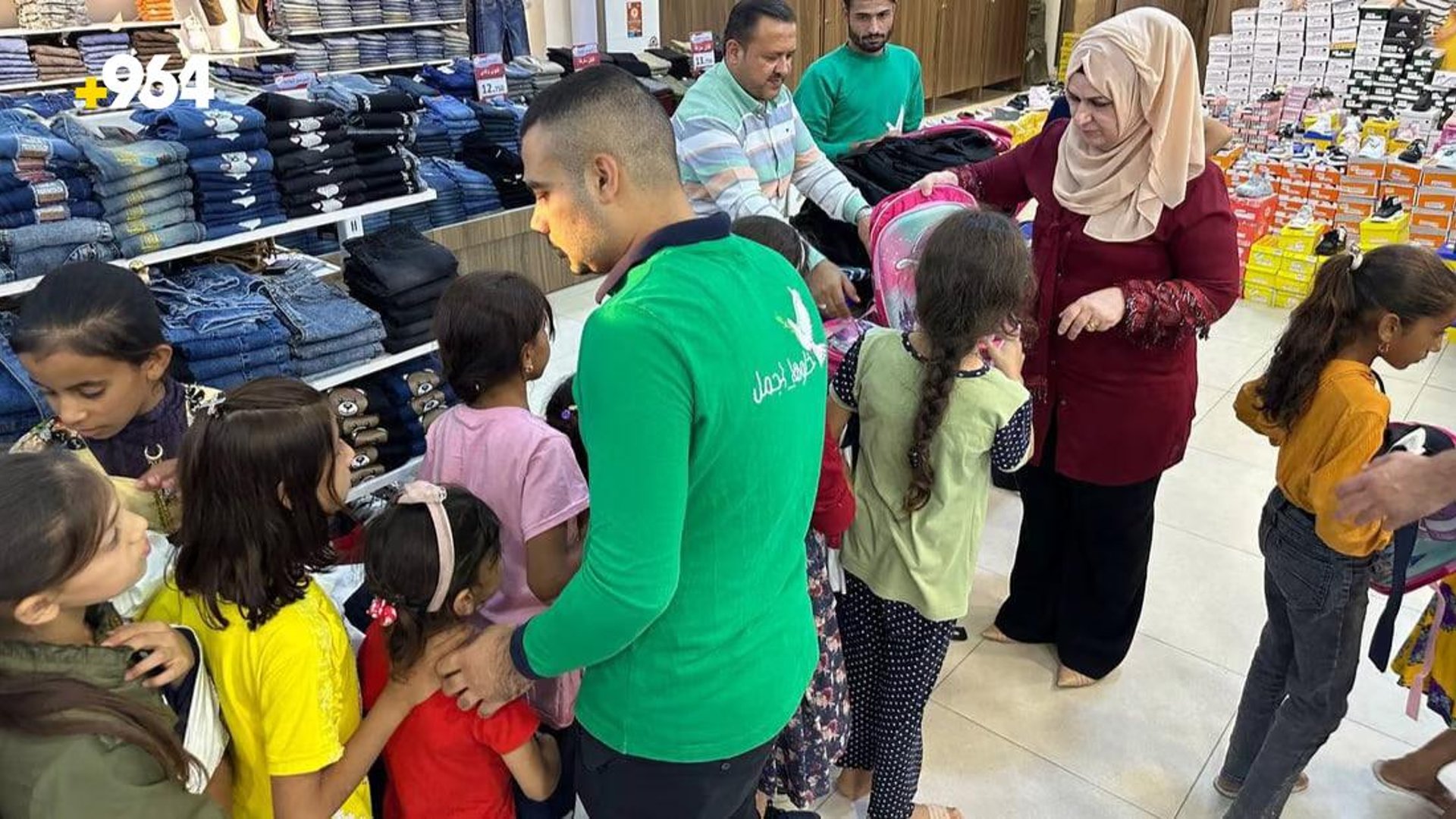 Volunteers in Mosul provide orphaned children with uniforms and school supplies