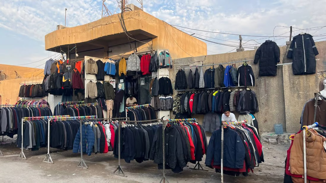 Second-hand winter clothes market in Basra offers global brands at bargain prices