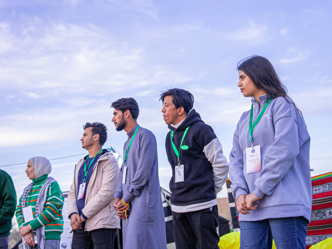 Volunteers organize eco-friendly camp in Samawah desert