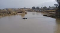 الصيادون يهرعون الى نهر الزاب في التون كوبري خلال موجة ...