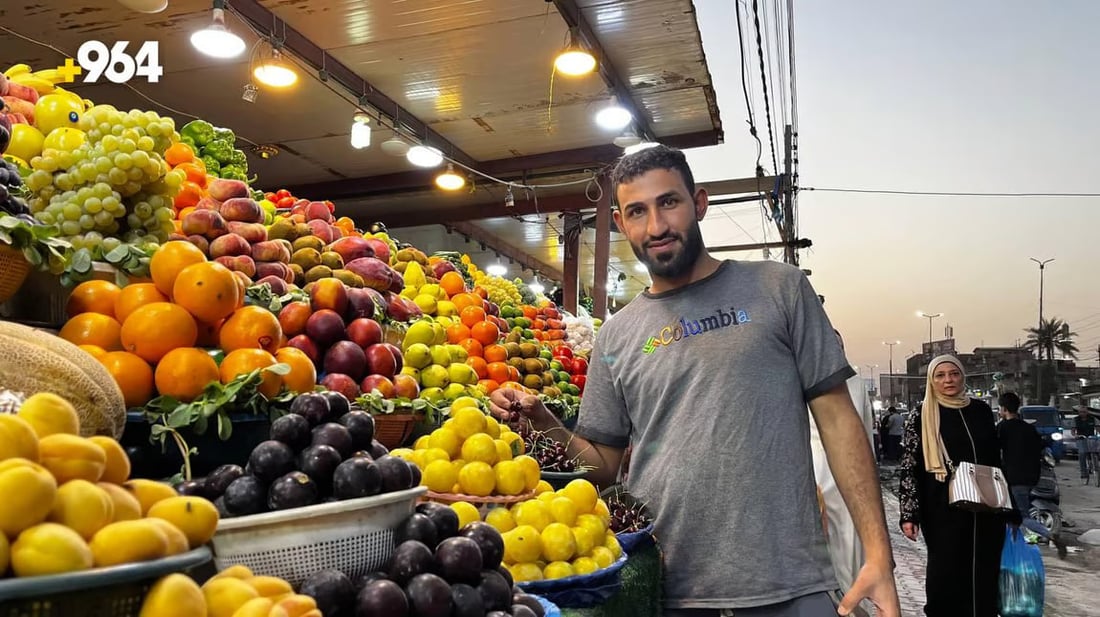 Vendor’s colorful display of fruits and vegetables attracts customers in Basra