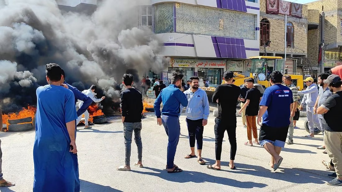 Nasiriyah protestors block main roads with burning tires