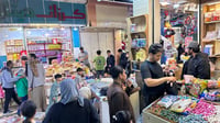 صور من سوق العشار: أطنان من الحلوى من أجل ليلة الكركيعا...