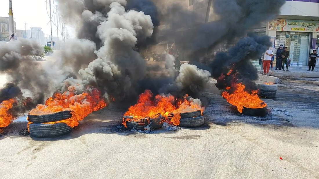 Nasiriyah protestors block main roads with burning tires