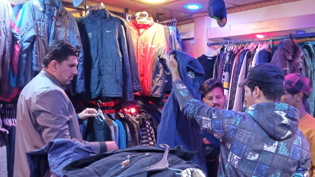 Thriving business in Karbala’s second-hand market offers deals on fashion