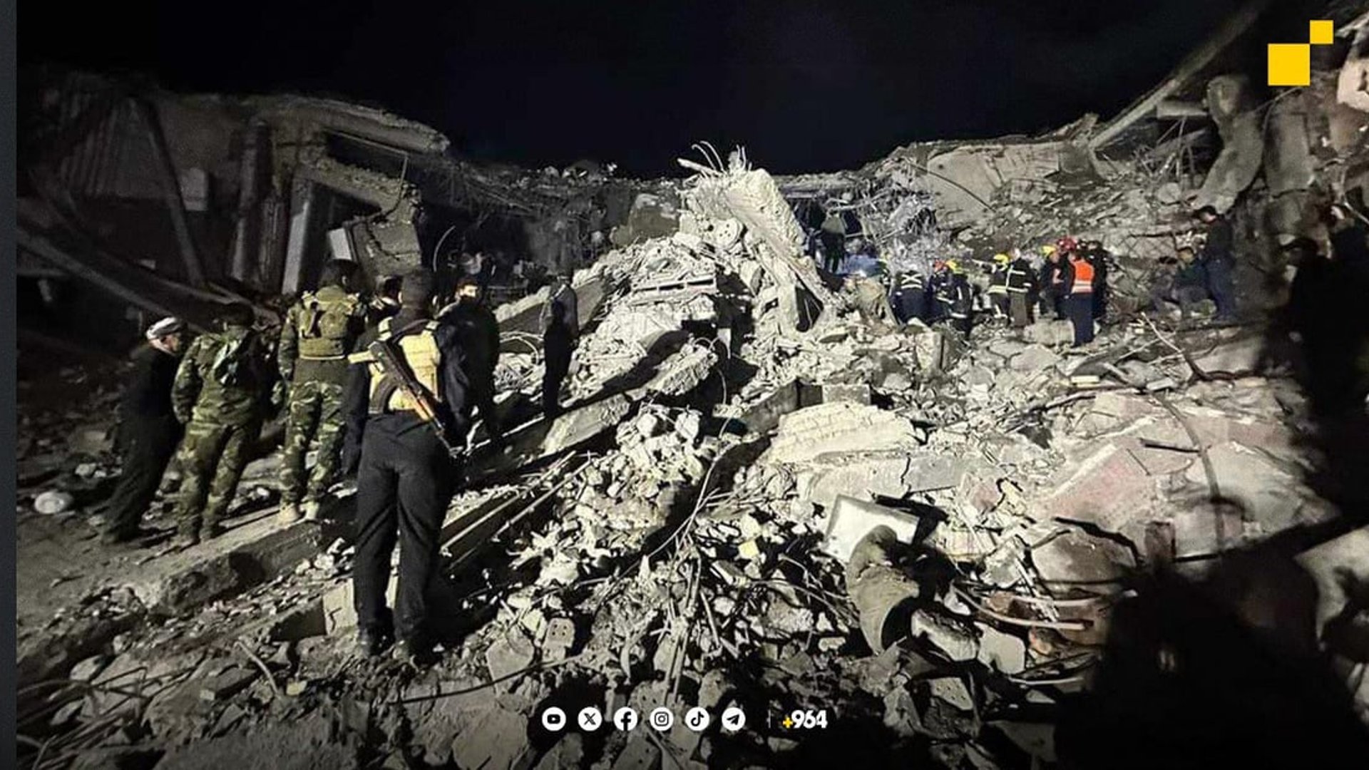 Civil defense teams search for the missing in the Erbil attack