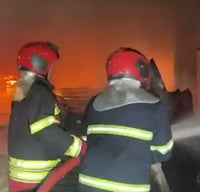 Langa market Erbil fire and efforts to control blaze underway