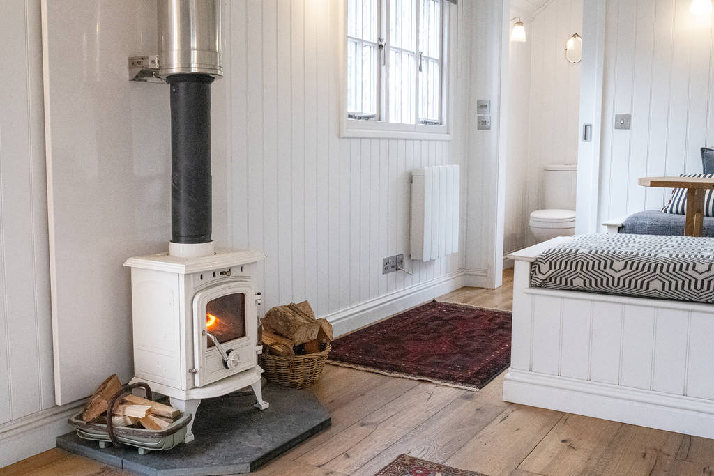Heat up the wood-burner inside Ragnarr at Spring Park in Cornwall