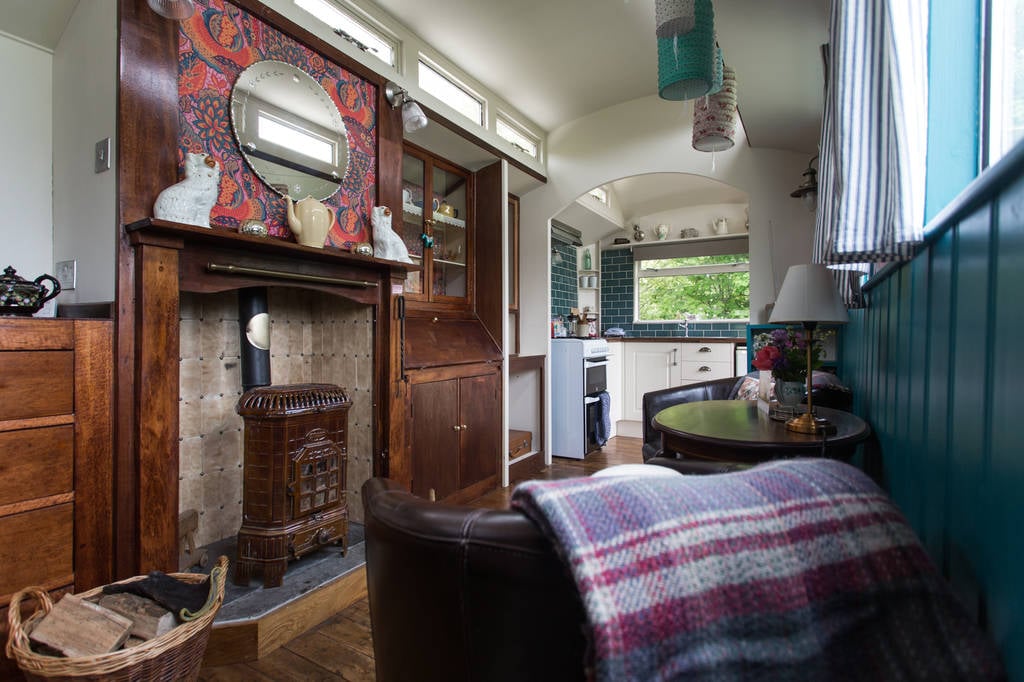 wagon, interior, kitchen, sitting area, wood burner