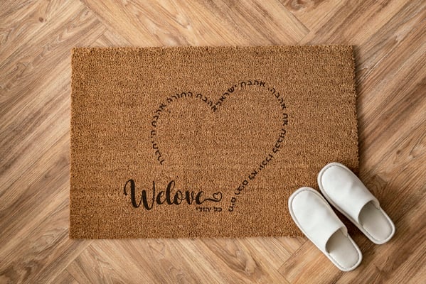 White slippers on a doormat