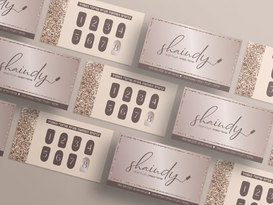 כרטיס ביקור שיינדי הומניר מעודכן עם פרח 02-Recoveredי~1