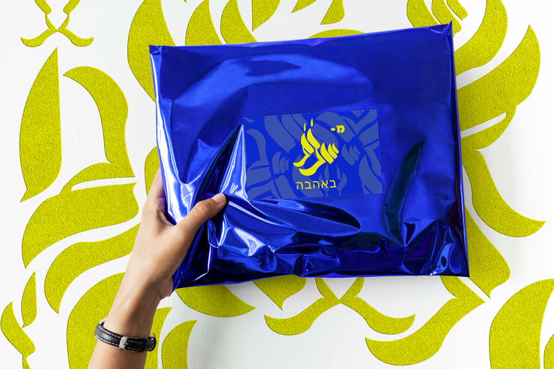 Woman holding up a package mockup