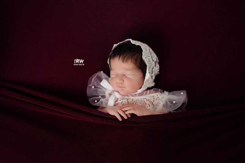 0504130218 אחוה פלוטקין צלמת2