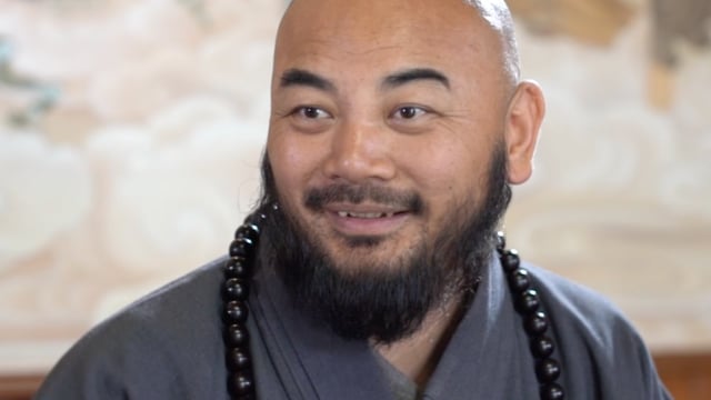 隔行不隔理——万行法师